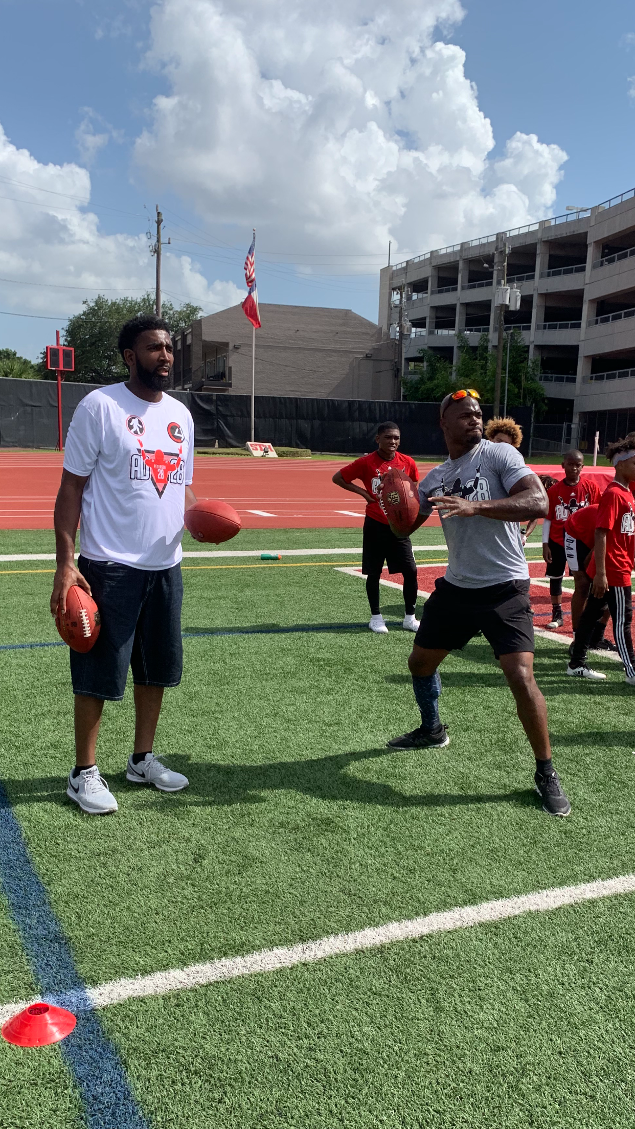 Derrick with Adrian Peterson