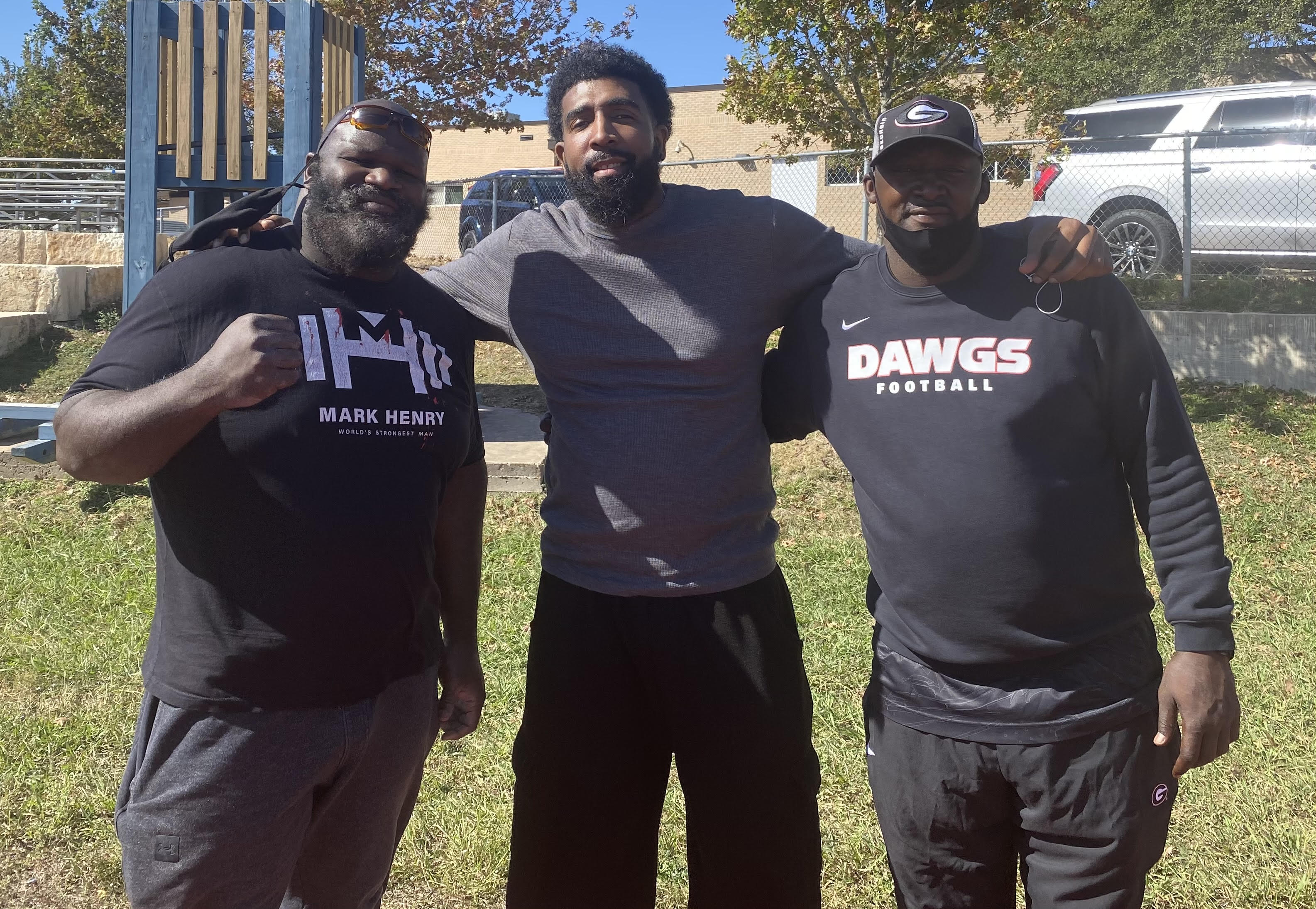 Derrick with Mark Henry and Quincy L. Carter