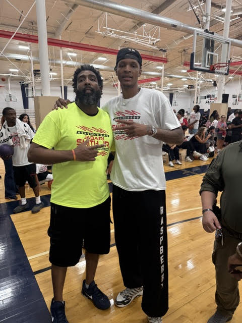 Derrick w/ NBA Two-way player Jabari Smith Jr.